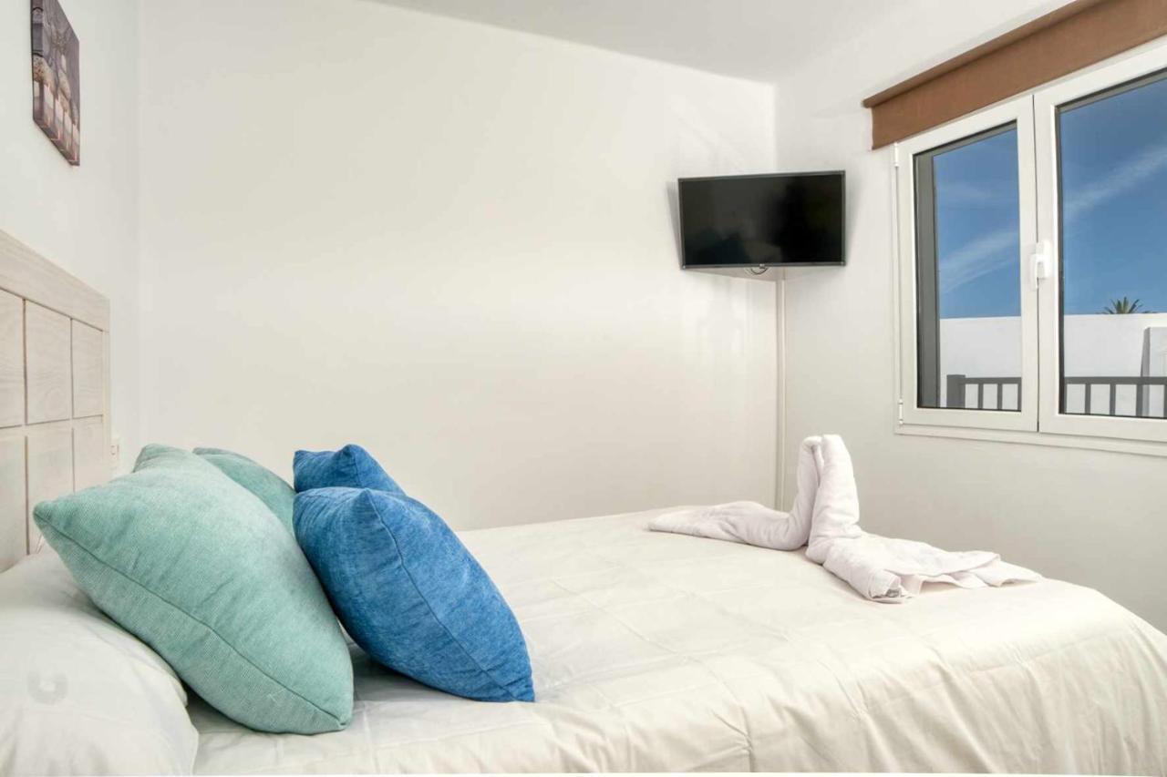 Luminosa vivienda vacacional con vista a la piscina Costa Teguise Exterior foto