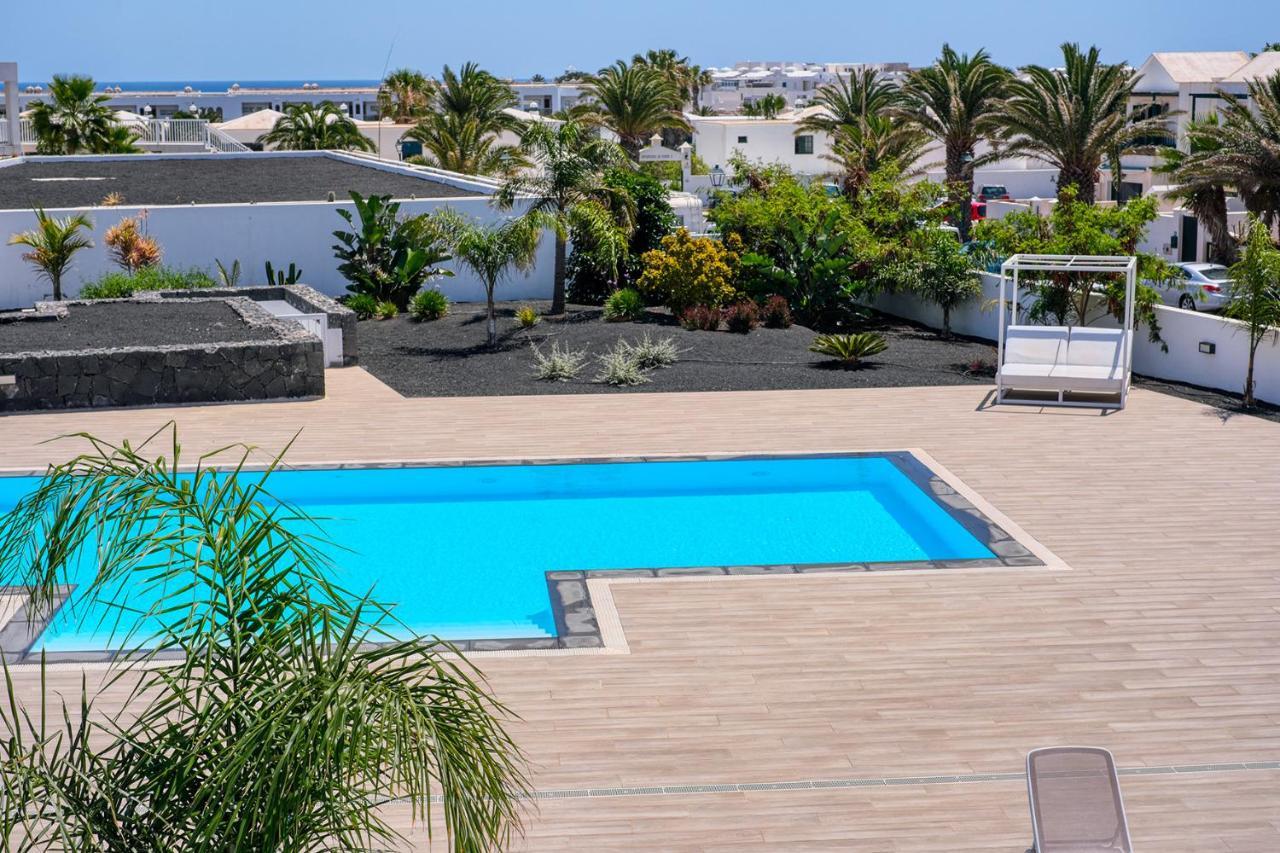 Luminosa vivienda vacacional con vista a la piscina Costa Teguise Exterior foto